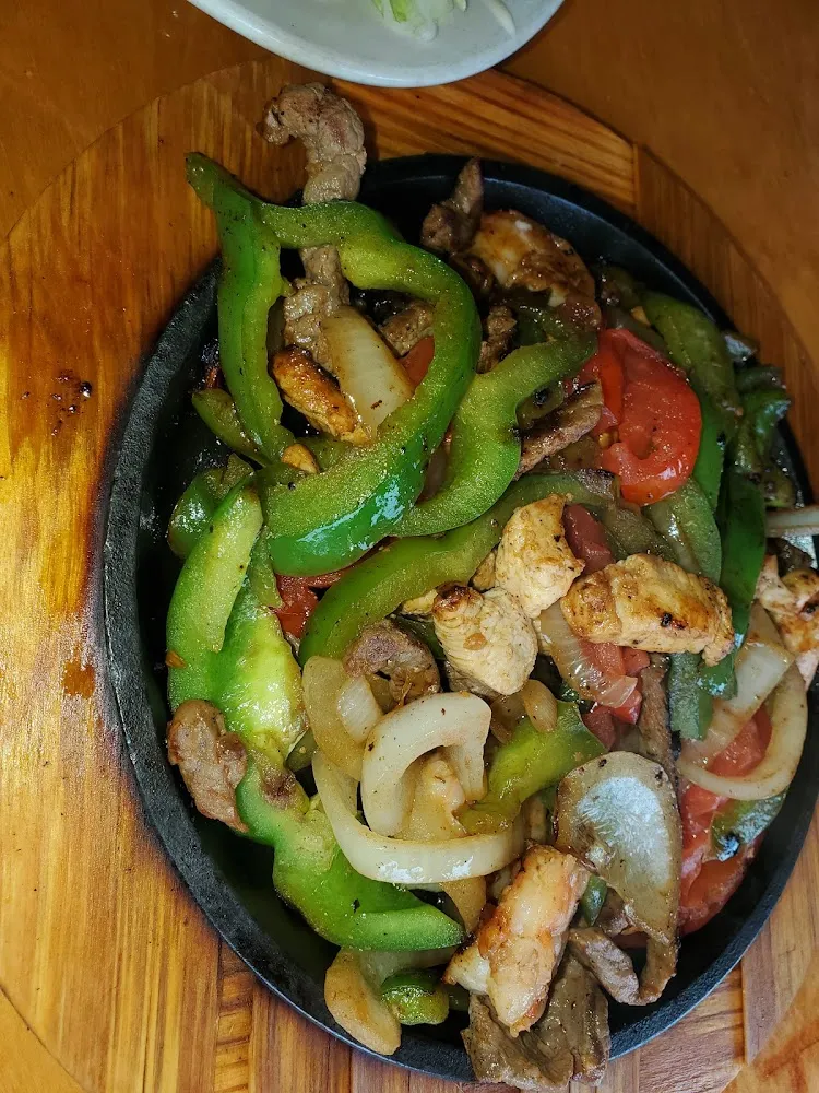 Steak Shrimp Chicken Combo Fajitas